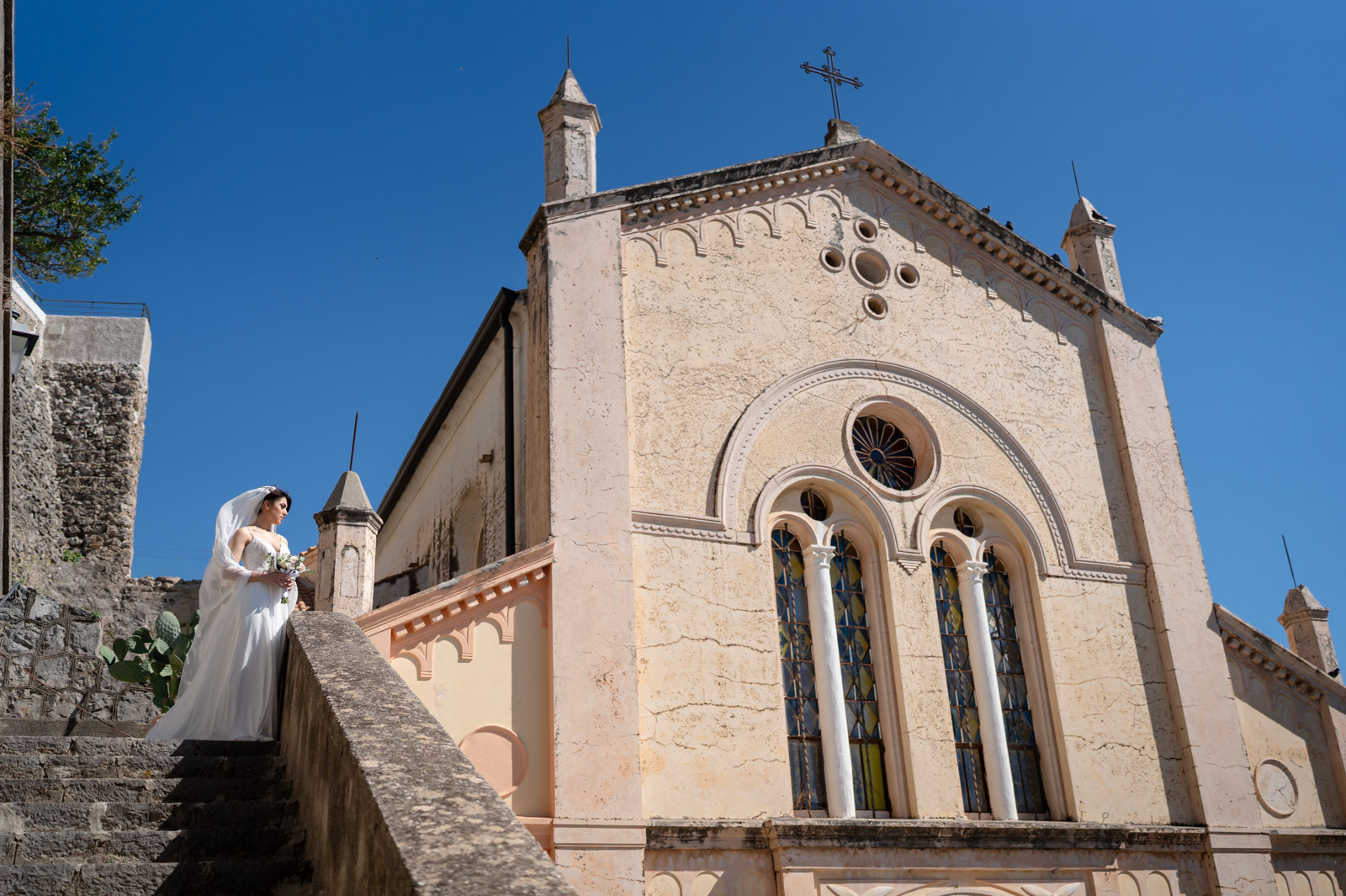 Bride twirling in her wedding dress on a terrace in Amalfi