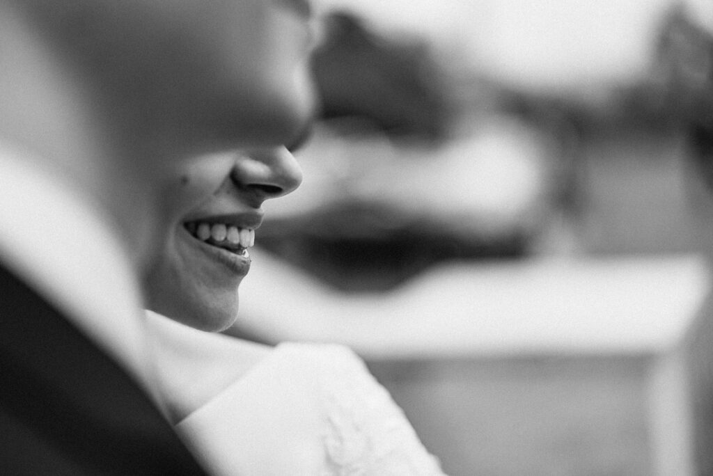 Artistic shot of the bride and groom with St. Peter’s Basilica in the distance